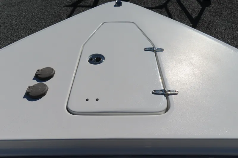 Slide: The Image of 2025 Sea Hunt Gamefish 27 Forward Seating boat deck with hatch and fittings. - 17