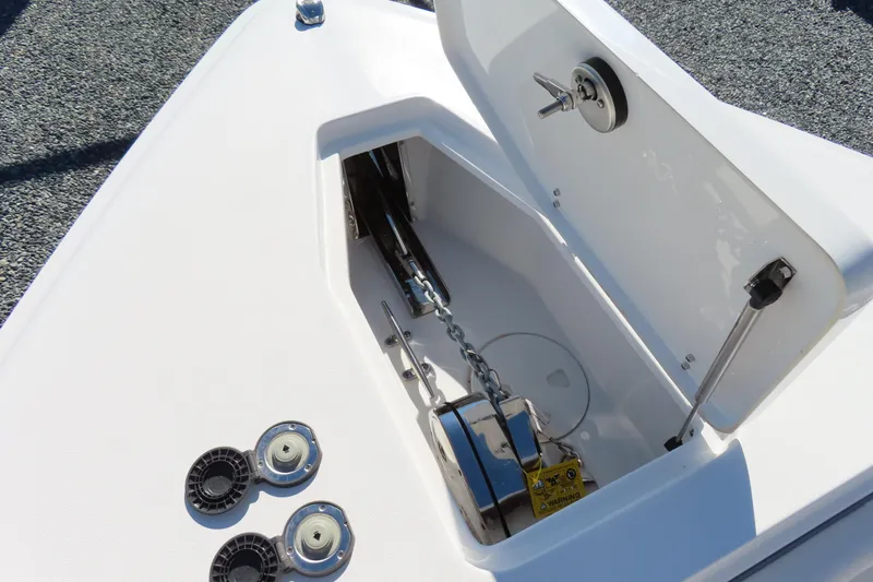 Slide: The Image of Anchor compartment of 2025 Sea Hunt Gamefish 27 Forward Seating boat. - 18