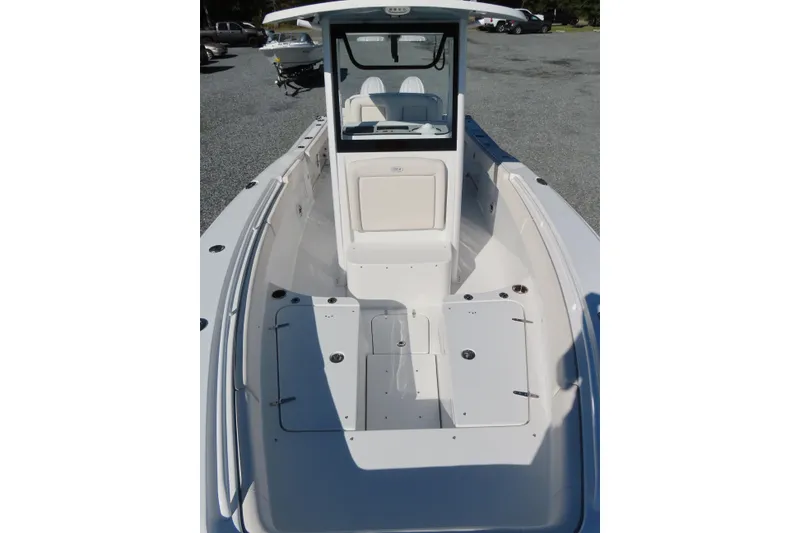 Slide: The Image of 2025 Sea Hunt Gamefish 27 Forward Seating boat interior, showcasing spacious deck and seating. - 19