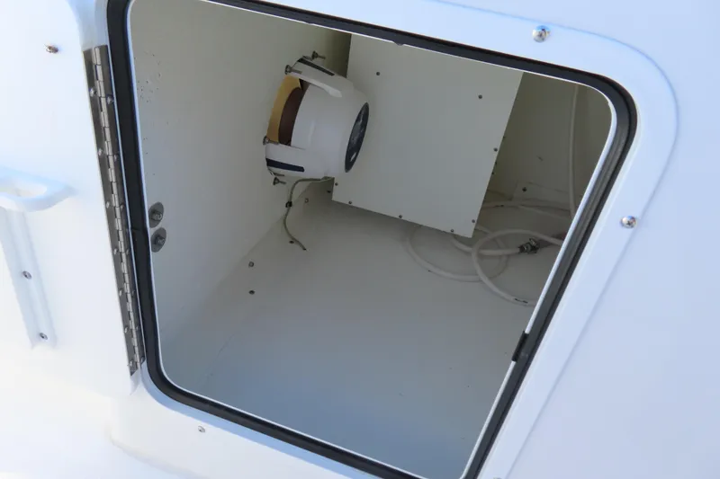Slide: The Image of Storage compartment on 2025 Sea Hunt Gamefish 27 Forward Seating boat. - 35