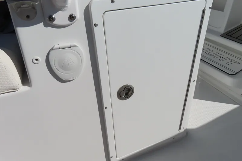 Slide: The Image of 2025 Sea Hunt Gamefish 27 Forward Seating boat storage compartment detail. - 36