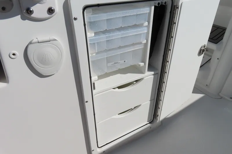 Slide: The Image of Storage compartment on 2025 Sea Hunt Gamefish 27 Forward Seating boat. - 37