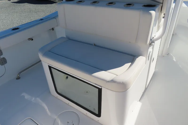 Slide: The Image of 2025 Sea Hunt Gamefish 27 Forward Seating with cushioned bench and storage compartment. - 39