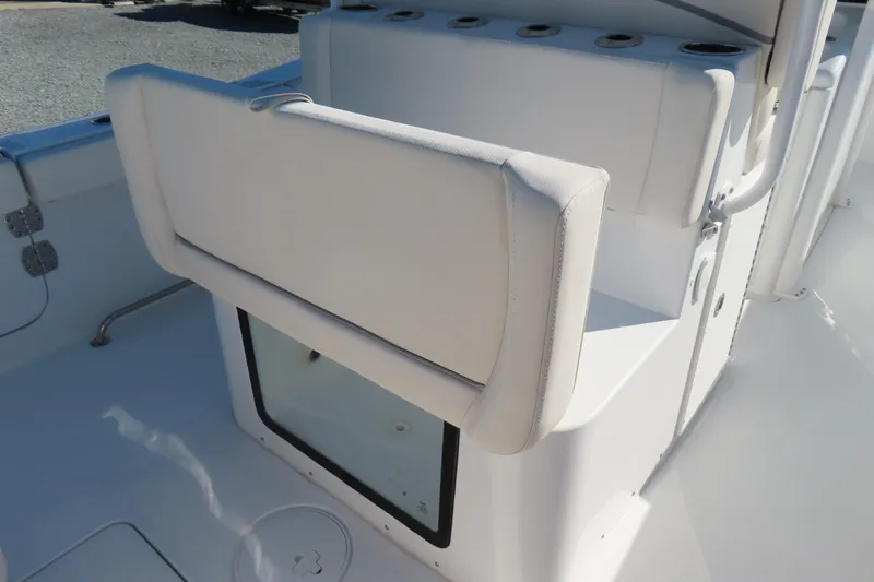 Slide: The Image of 2025 Sea Hunt Gamefish 27 boat interior with forward seating and storage compartment. - 40