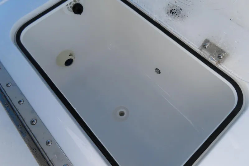 Slide: The Image of Livewell compartment on 2025 Sea Hunt Gamefish 27 Forward Seating boat. - 41