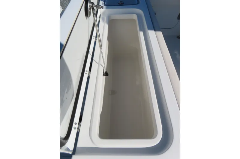 Slide: The Image of Open storage compartment on 2025 Sea Hunt Gamefish 27 Forward Seating boat. - 47