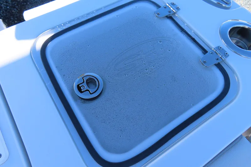 Slide: The Image of Hinged compartment on 2025 Sea Hunt Gamefish 27 Forward Seating boat. - 48