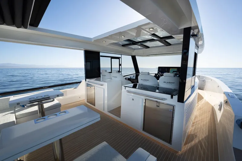 Slide: The Image of Luxurious 2026 De Antonio Yachts 50 Coupe interior with modern design and ocean view. - 16