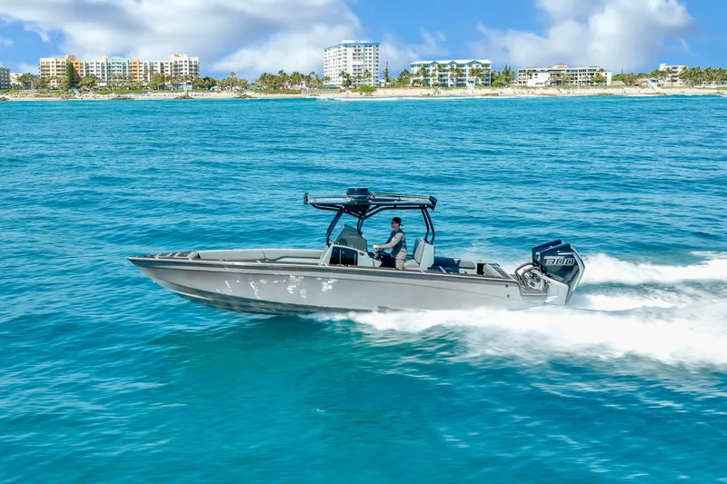 Slide: The Image of Cruising on blue ocean near coastal cityscape. - 30