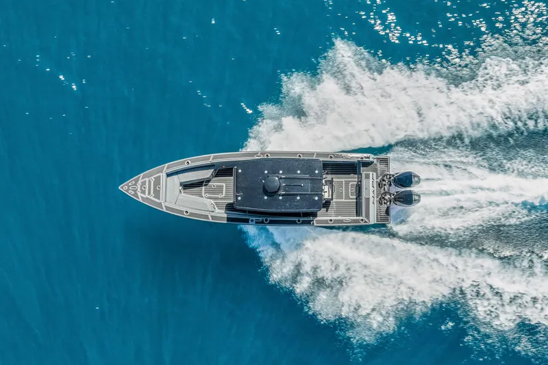 Slide: The Image of Aerial view of boat cruising on blue water. - 31