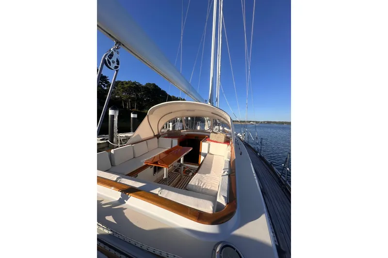 Slide: The Image of 1983 Camper & Nicholsons Cutter Rig sailboat with spacious deck and seating area. - 14