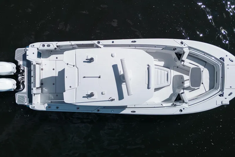Slide: The Image of Overhead view of 2021 Blackfin 332 CC boat on water. - 103