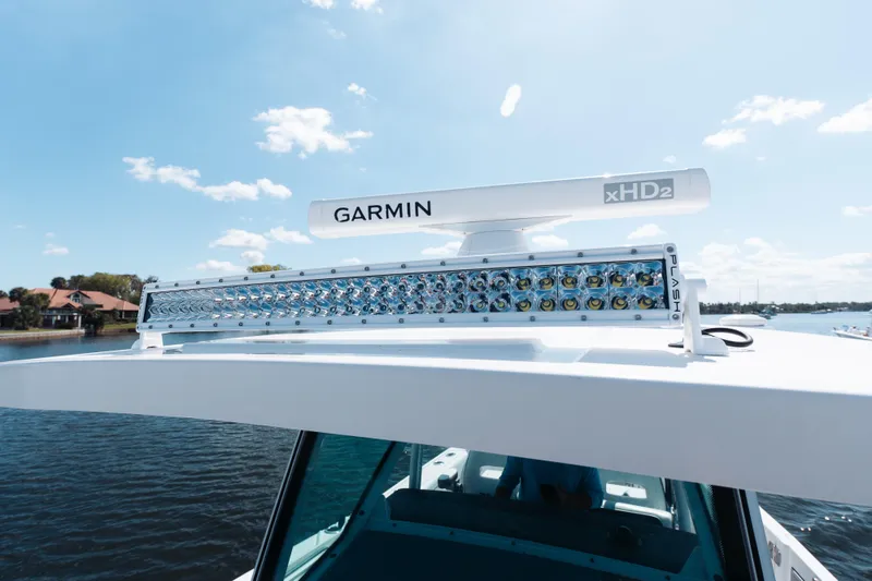Slide: The Image of 2021 Blackfin 332 CC boat with Garmin xHD2 radar and LED light bar. - 59