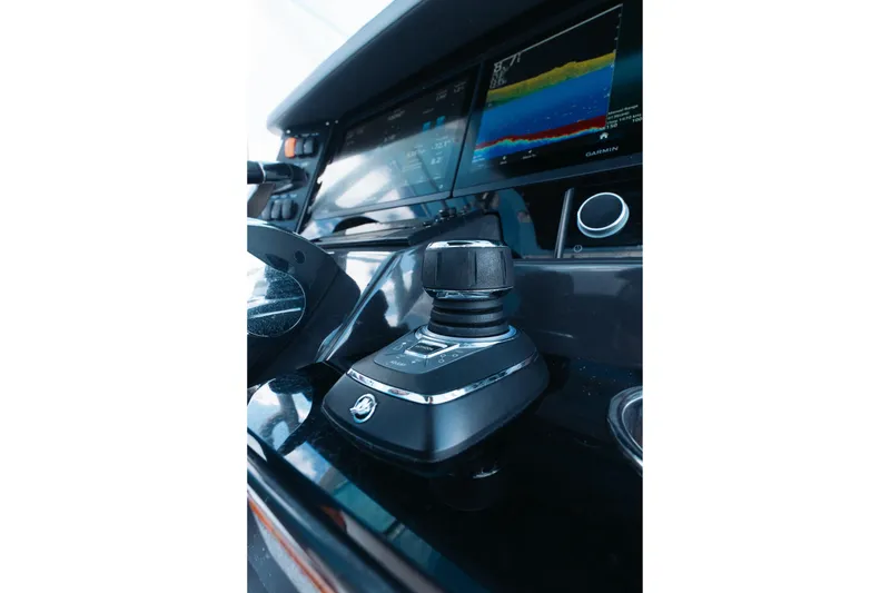 Slide: The Image of 2021 Blackfin 332 CC helm with joystick control and navigation display. - 78