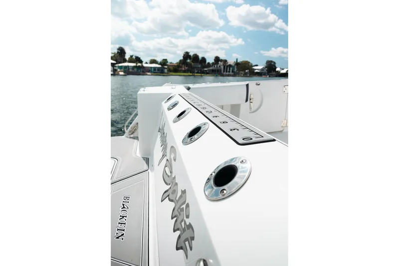 Slide: The Image of 2021 Blackfin 332 CC boat deck with rod holders and measurement guide. - 96