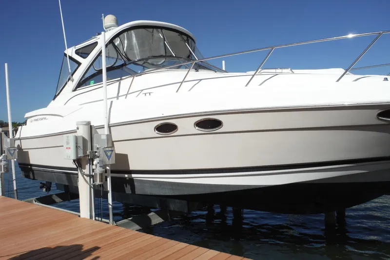 The Image of 2008 Regal Commodore 3760 IO boat docked, featuring sleek design and modern amenities. - 0