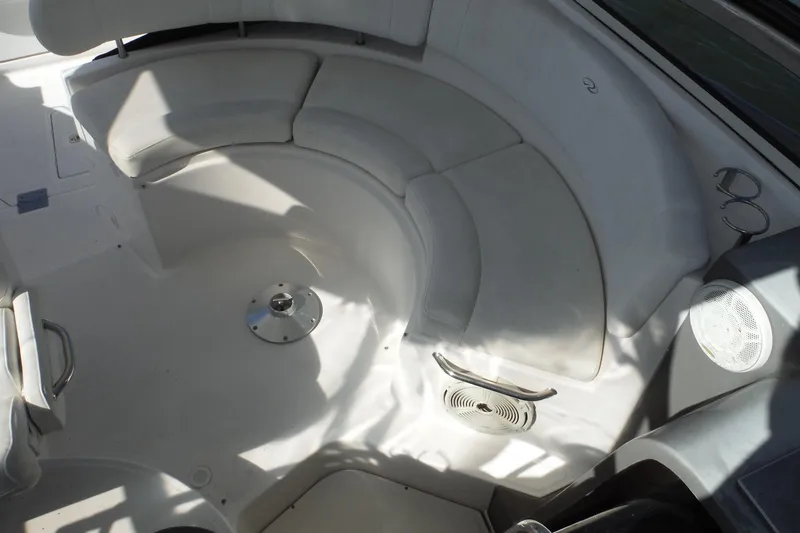 Slide: The Image of 2008 Regal Commodore 3760 IO boat interior with curved seating and cup holders. - 11