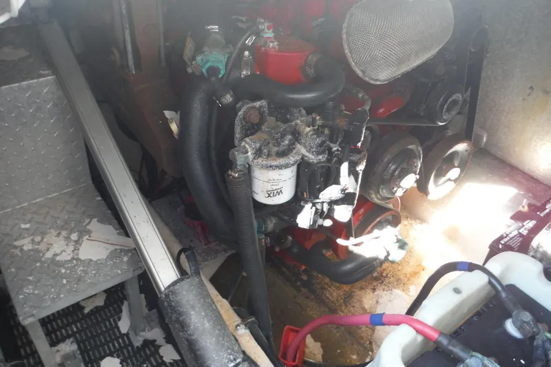 Slide: The Image of Engine compartment of 2008 Regal Commodore 3760 IO boat, showing mechanical components. - 22