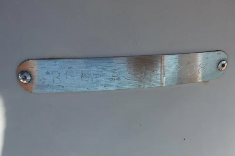 Slide: The Image of 2008 Regal Commodore 3760 IO metal identification plate with engraved serial number. - 27