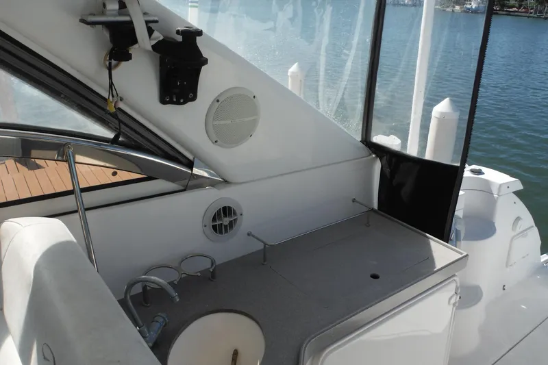 Slide: The Image of 2008 Regal Commodore 3760 IO boat interior with sink and countertop by the water. - 40