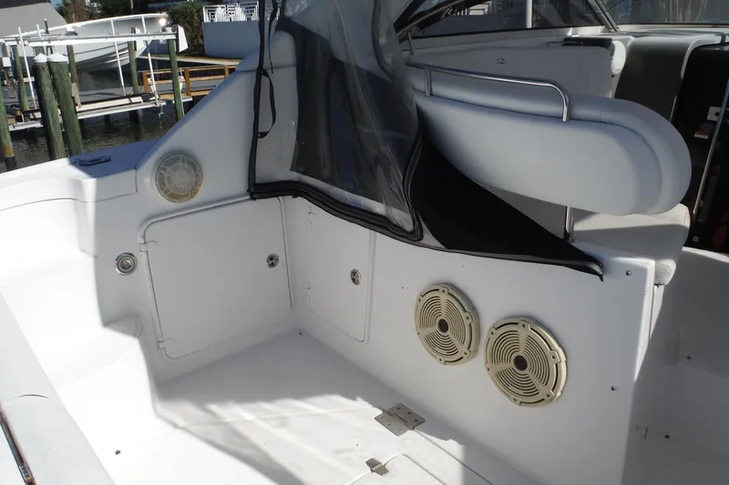Slide: The Image of 2008 Regal Commodore 3760 IO boat interior with seating and speakers. - 8