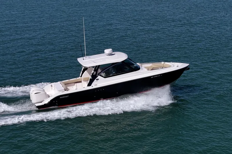 Slide: The Image of 2017 Pursuit DC 295 Dual Console boat cruising on open water. - 56