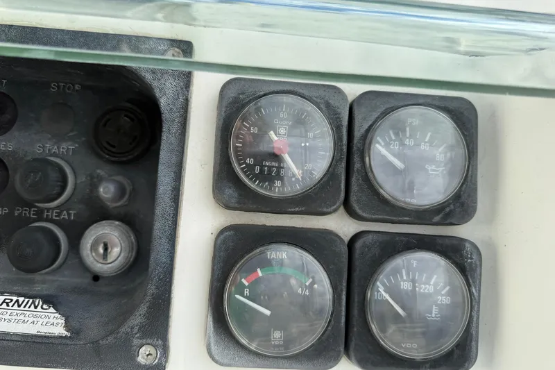 Slide: The Image of Control panel of a 2000 Beneteau 361 sailboat with gauges and ignition. - 22
