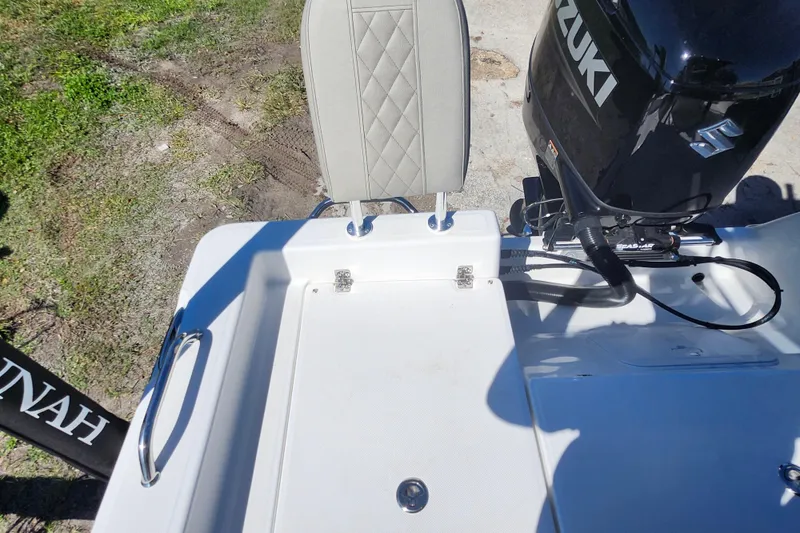 Slide: The Image of 2026 Savannah 210X boat with Suzuki engine, featuring a sleek design and comfortable seating. - 28