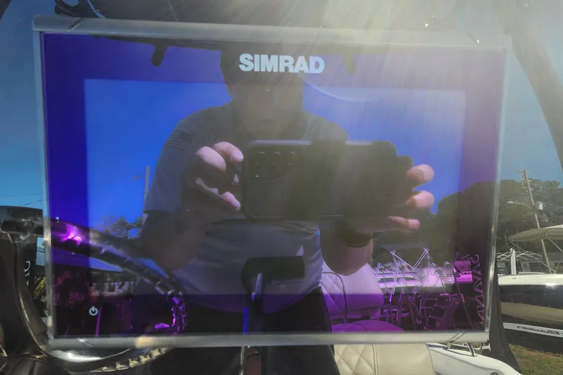 Slide: The Image of Reflection on Simrad screen in 2026 Savannah 210X boat cockpit. - 34