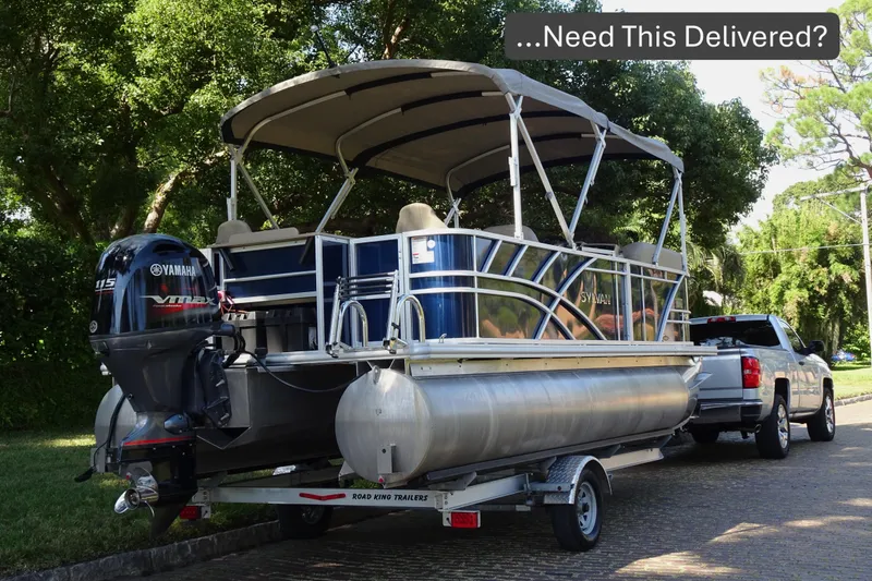 Slide: The Image of 2023 Sylvan Mirage Fish 820 Party Fish pontoon boat on trailer, ready for delivery. - 2