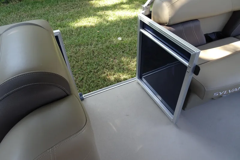 Slide: The Image of 2023 Sylvan Mirage Fish 820 Party Fish boat interior with open gate and seating. - 21