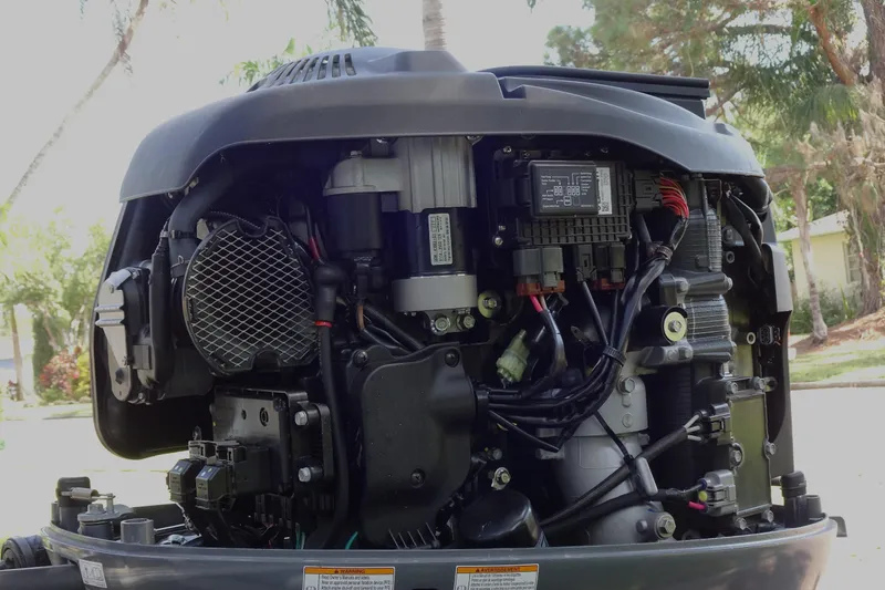 Slide: The Image of 2023 Sylvan Mirage Fish 820 Party Fish engine, detailed view of internal components. - 26