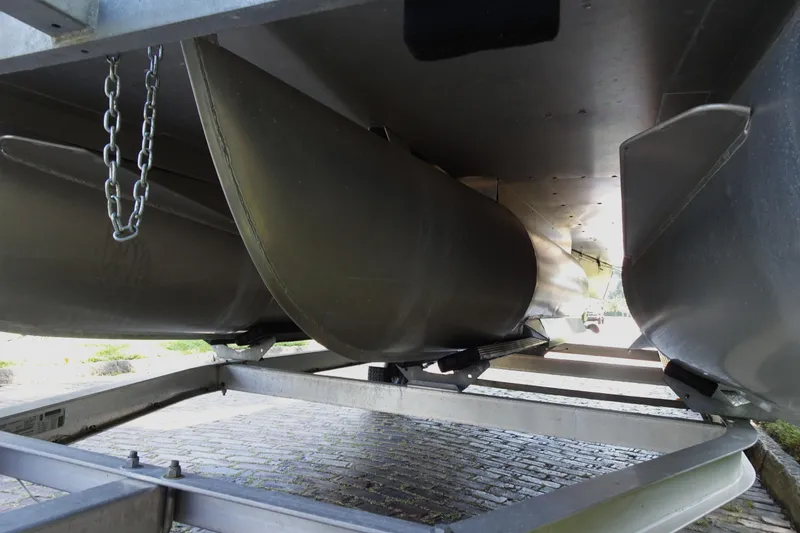 Slide: The Image of Underneath view of 2023 Sylvan Mirage Fish 820 Party Fish pontoon boat on trailer. - 28