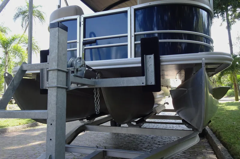 Slide: The Image of 2023 Sylvan Mirage Fish 820 Party Fish pontoon boat on trailer. - 8