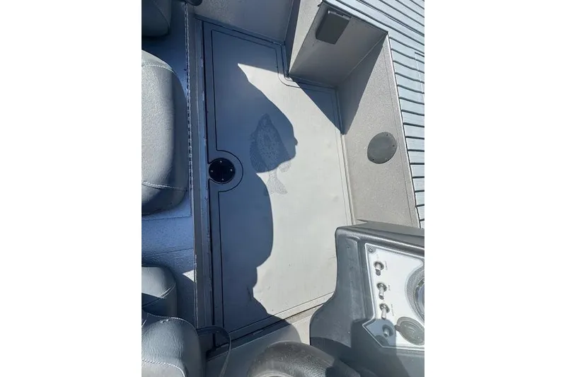 Slide: The Image of 2020 Lowe Stinger 175 boat interior with seating and control panel. - 5