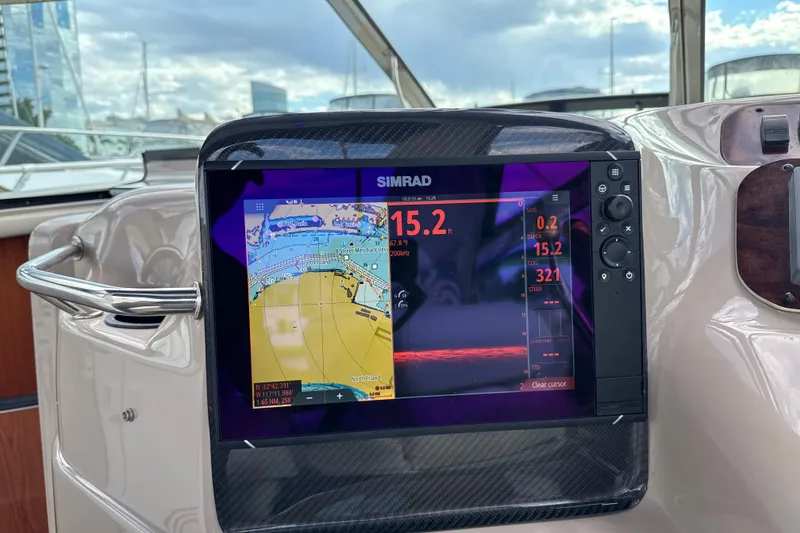 Slide: The Image of Simrad navigation display on 1999 Sea Ray Sundancer 400 yacht, showing depth and map. - 13