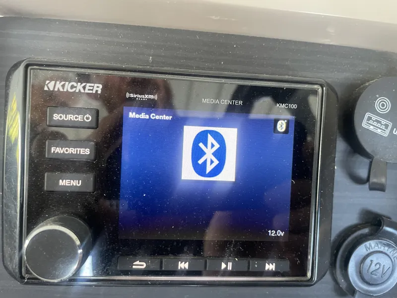 Slide: The Image of Kicker media center with Bluetooth connectivity in a 2020 Bennington SSRFBXP. - 20