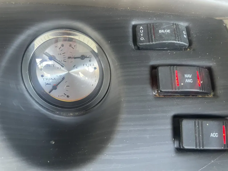 Slide: The Image of Dashboard of a 2020 Bennington SSRFBXP boat with gauges and switches. - 22