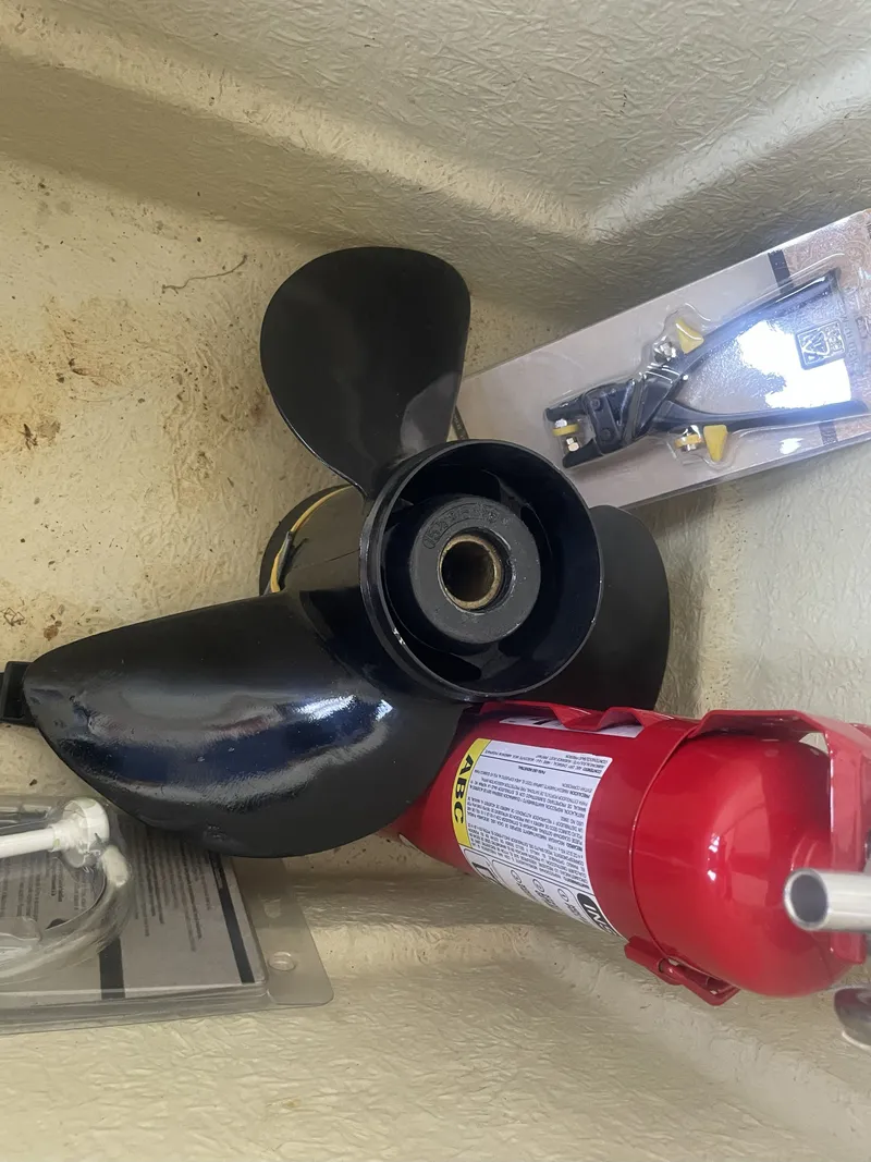 Slide: The Image of Boat propeller and fire extinguisher in storage, Bennington ssrfbxp 2020 model. - 31
