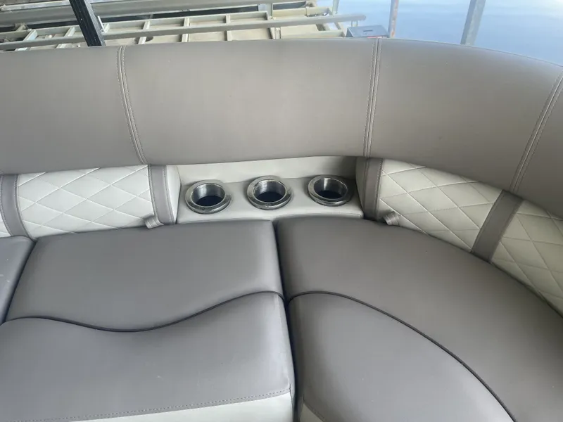 Slide: The Image of Luxurious Bennington SSRFBXP 2020 boat seating with cup holders and quilted upholstery. - 38