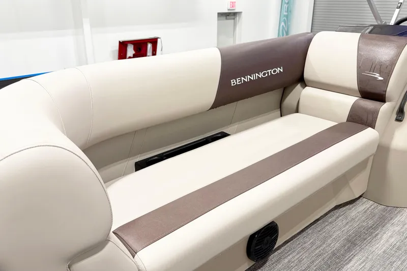 Slide: The Image of 2025 Bennington 20S boat interior with beige and brown seating. - 10