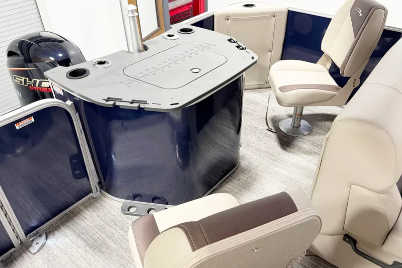 Slide: The Image of 2025 Bennington 20S boat interior with seating and control panel. - 12