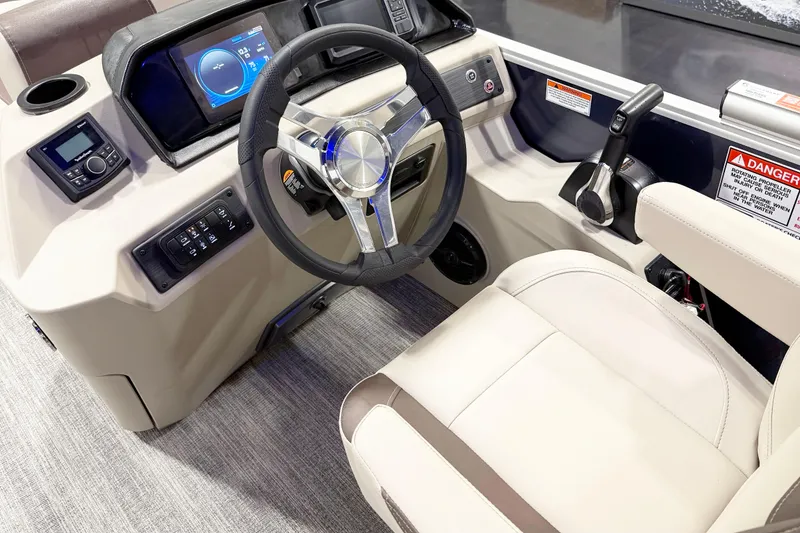 Slide: The Image of 2025 Bennington 20S boat interior with steering wheel and control panel. - 8