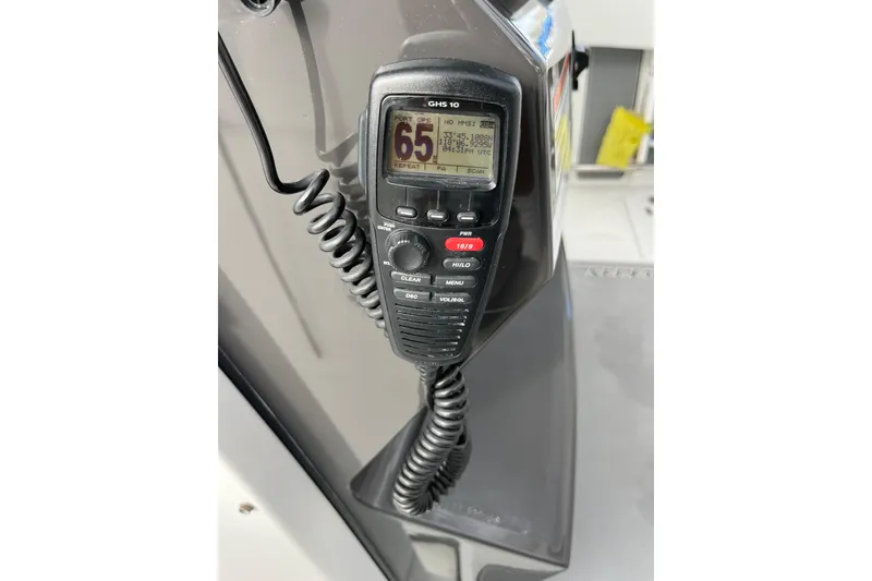 Slide: The Image of VHF marine radio on 2019 Blackfin 272 CC boat dashboard. - 20