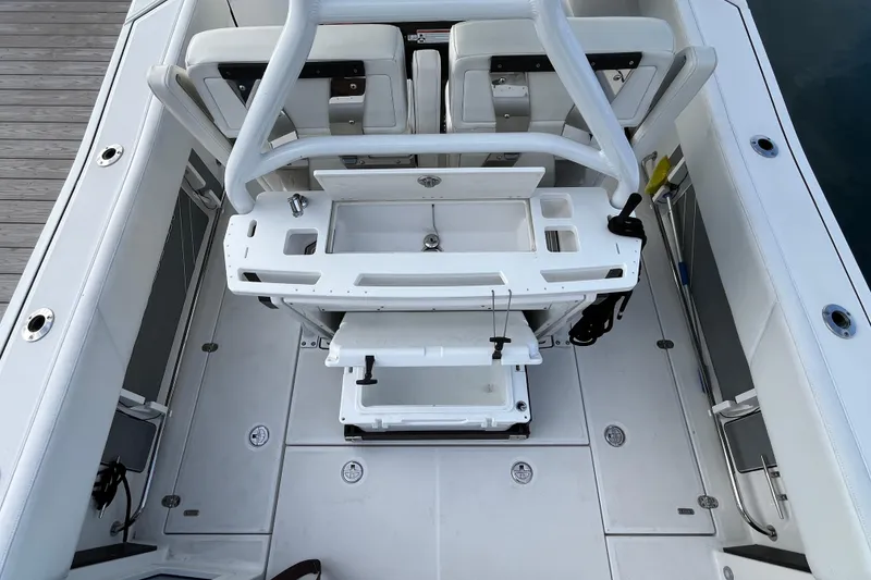 Slide: The Image of 2019 Blackfin 272 CC boat interior with seating and fishing station. - 27