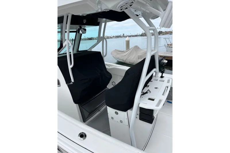 Slide: The Image of 2019 Blackfin 272 CC boat interior with covered seats - 44