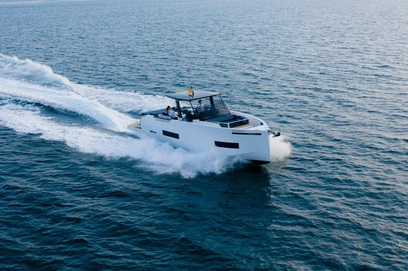 Slide: The Image of 2026 De Antonio Yachts 50 Open cruising on open water, showcasing sleek design and performance. - 3