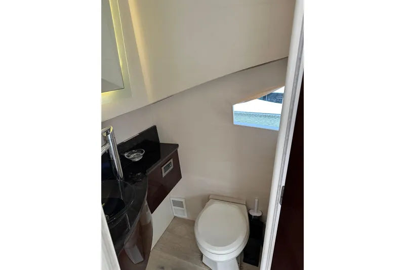 Slide: The Image of Luxurious bathroom in 2009 Lazzara LSX 75 yacht, featuring modern fixtures and sleek design. - 18