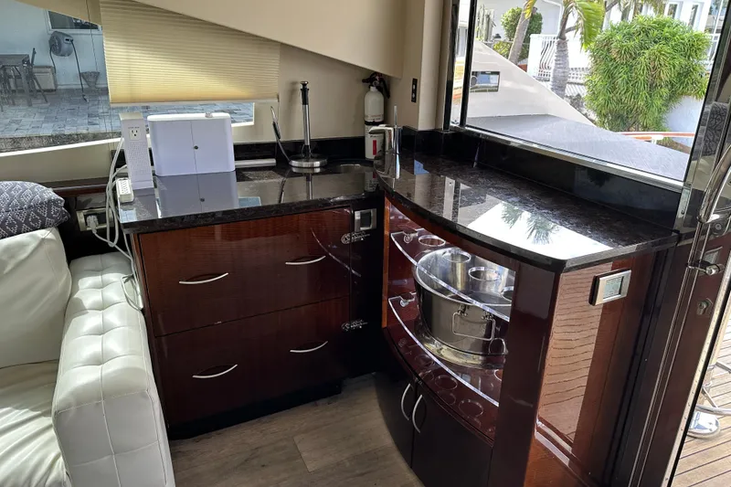 Slide: The Image of Luxurious 2009 Lazzara LSX 75 yacht interior with sleek kitchen and modern amenities. - 20