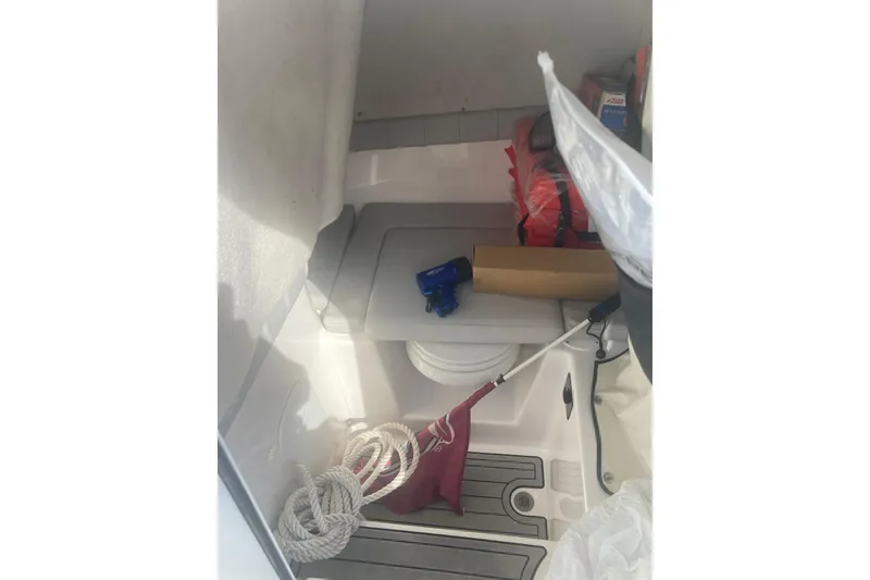 Slide: The Image of Interior of 2021 Sea Fox 249 Avenger boat with storage items and equipment. - 15